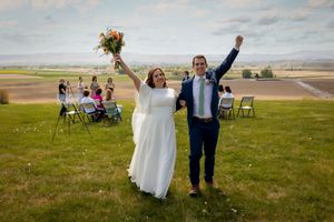 bride and groom celebrating after I Do at Garman Hill Wilder, Idaho