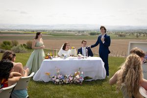 speeches at sweetheart's table with gorgeous view at Garman Hill Wilder, Idaho