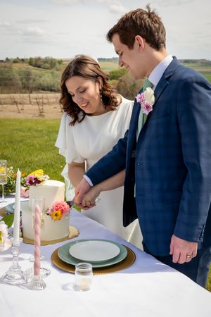 bride and groom cutting cake at Garman Hill Wilder, Idaho