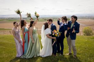 bridal party cheering overlooking valley at Garman Hill Wilder, Idaho