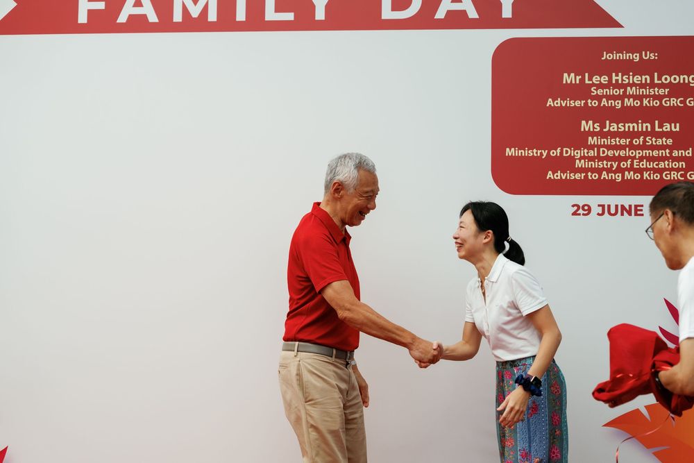 A promotional banner for Family Day event showing the date June 29 in white and red design.