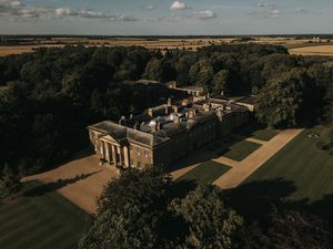 Aerial view of Rise Hall surrounded by lush woodlands in the countryside. Taken by Grimsby photographers.