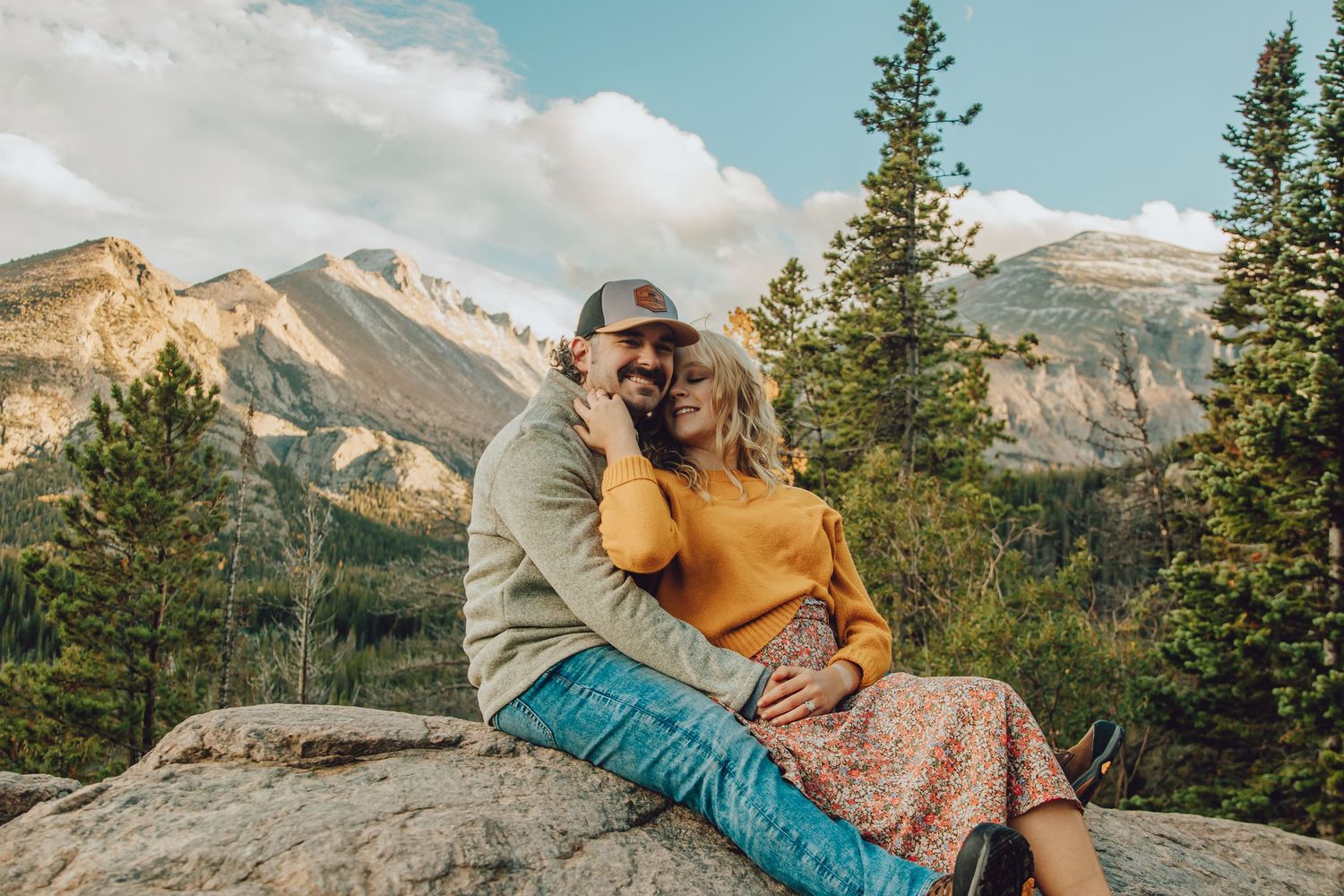 hiking couple eloping at Dream Lake, alpine scenery and glacial lake views, adventurous Rocky Mountain elopement