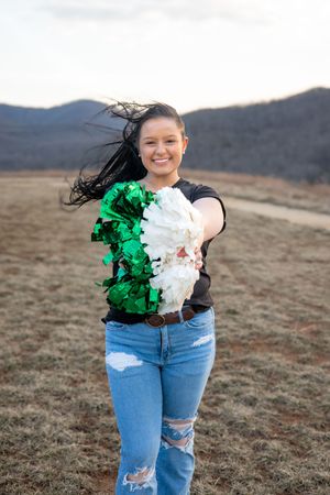 High school senior portraits in Waynesboro, Virginia. Include your hobbies and sports in your senior milestone photos (i.e. cheer).