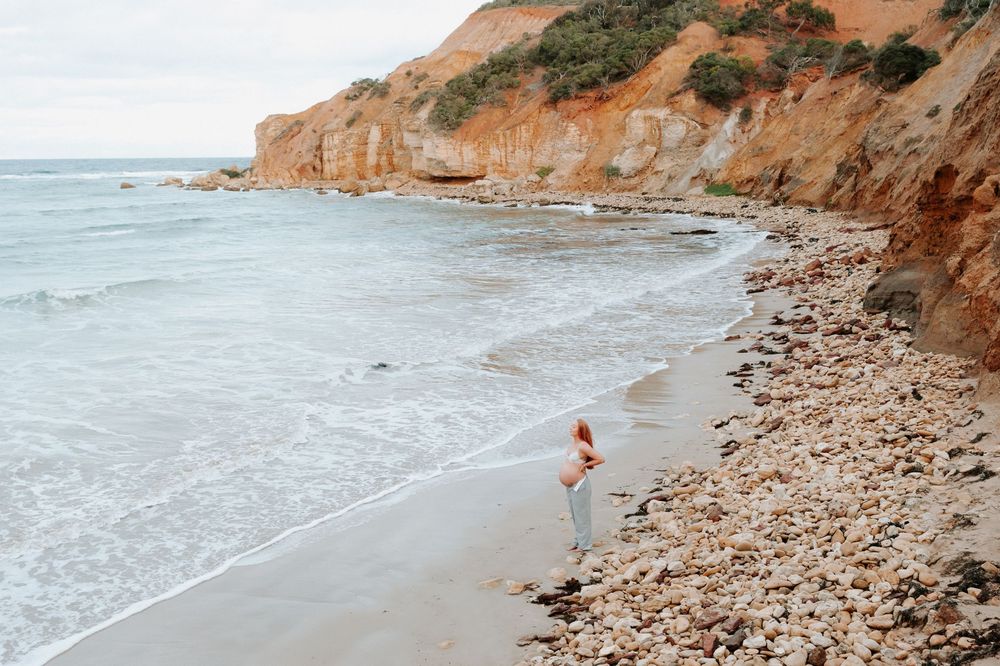 Rugged coastal cliffs and beach landscape with rocky formations along a misty shoreline.
Altona Family Photographer Melbourne