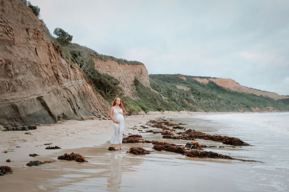 Rocky beach landscape with dramatic cliffs and coastal formations.
Altona Family Photographer Melbourne