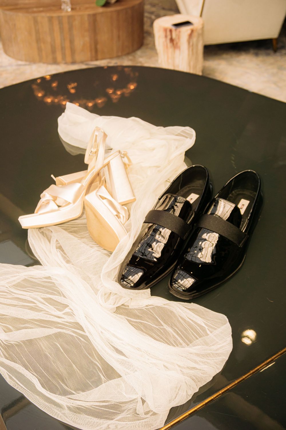 Colorado Springs Wedding Photographer. Photo of the bride and groom's shoes and veil displayed.