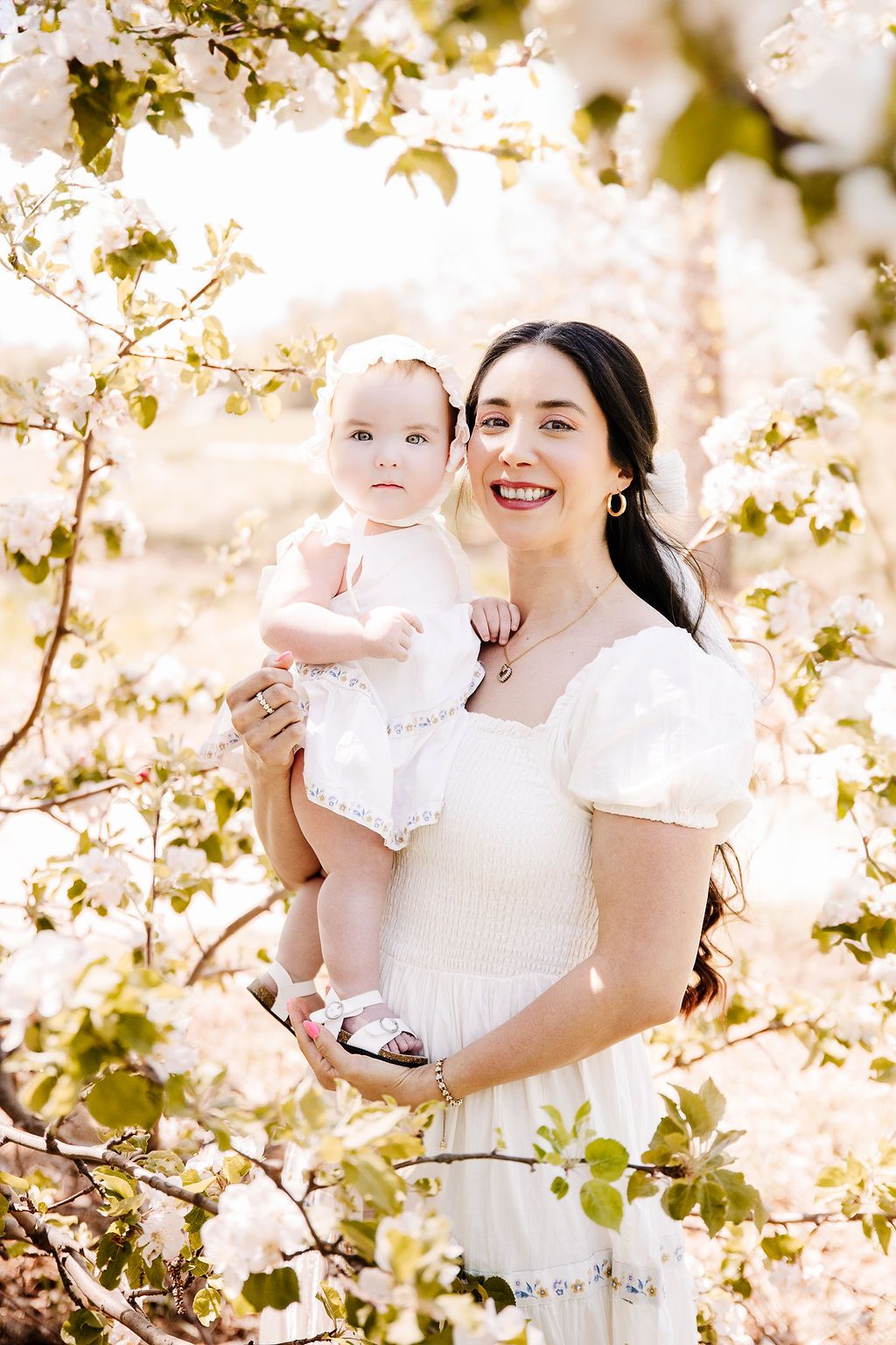 Mother and baby during a sunset mommy and me photoshoot in Northern Colorado, captured in warm golden light.