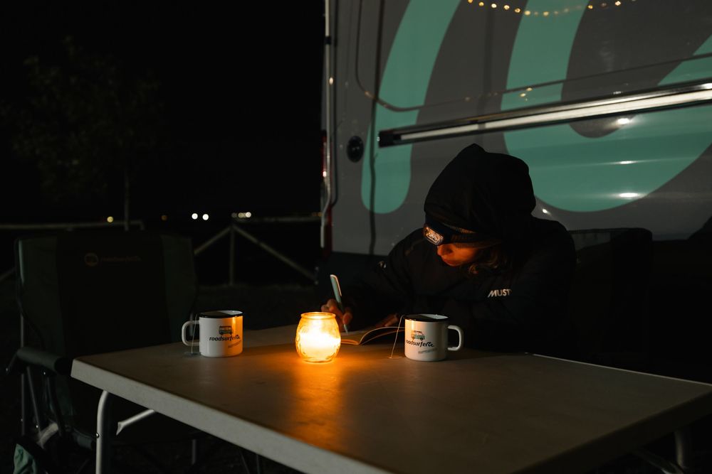 Cozy evening scene with string lights and warm ambiance in an outdoor setting.