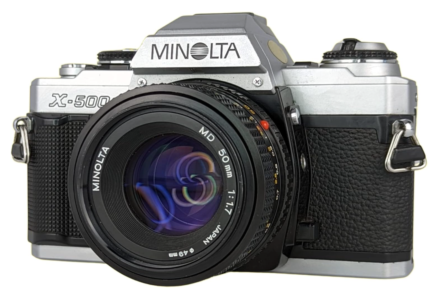 Vintage Minolta film cameras and lenses displayed in a row showing different angles and models.