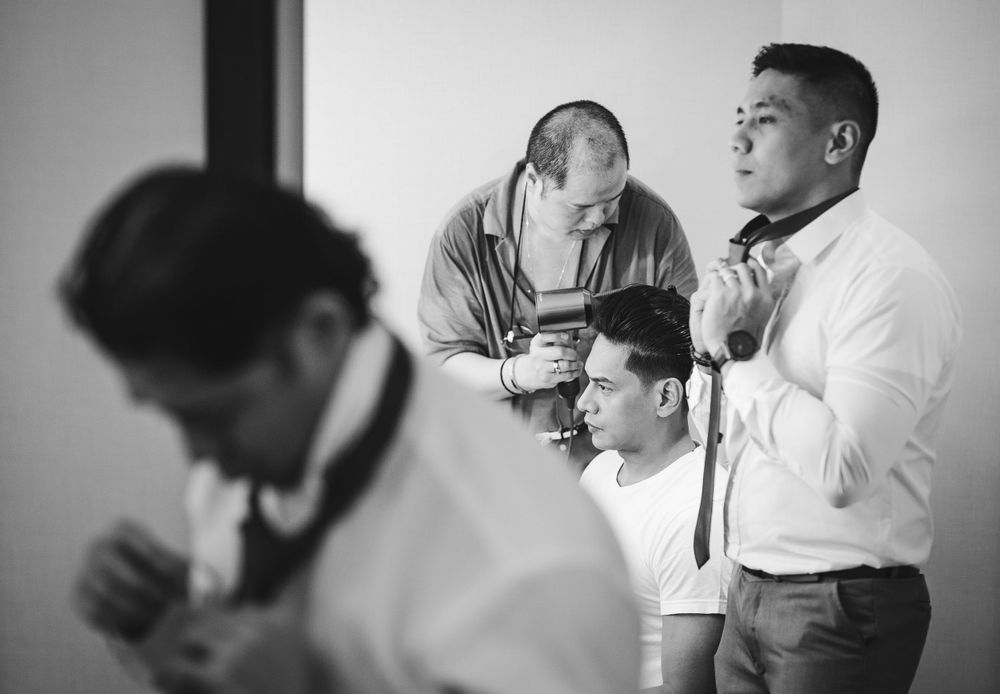 Black and white image of preparations for a formal event.