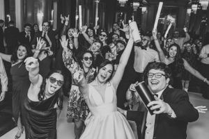 Wedding reception party guests dancing and celebrating in black and white photography. Wedding at the Hotel Bentley in Alexandria, La