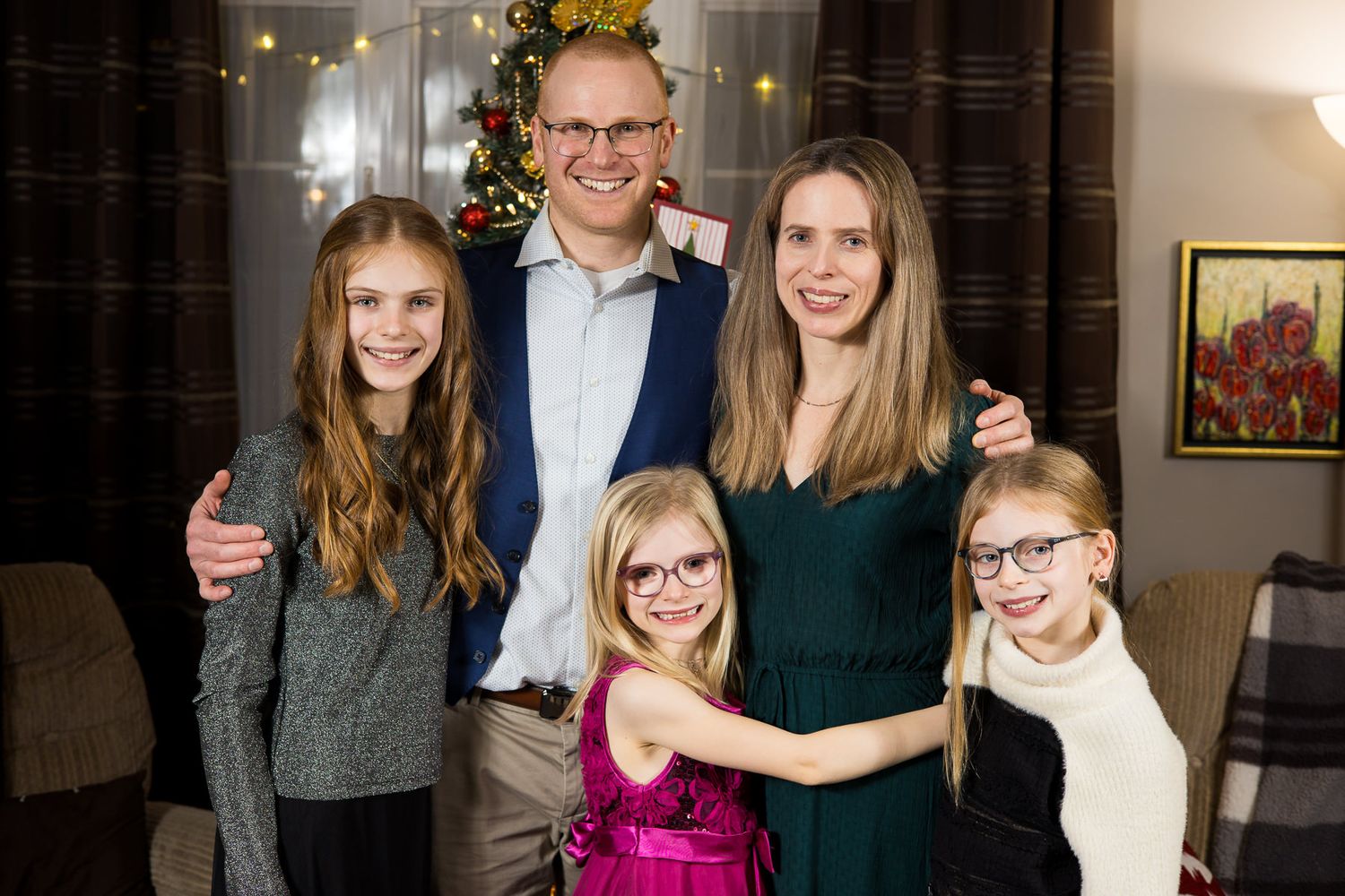 Photo du photographe Brophoto avec sa conjointe et ses trois enfants, durant la fête de Noël.
