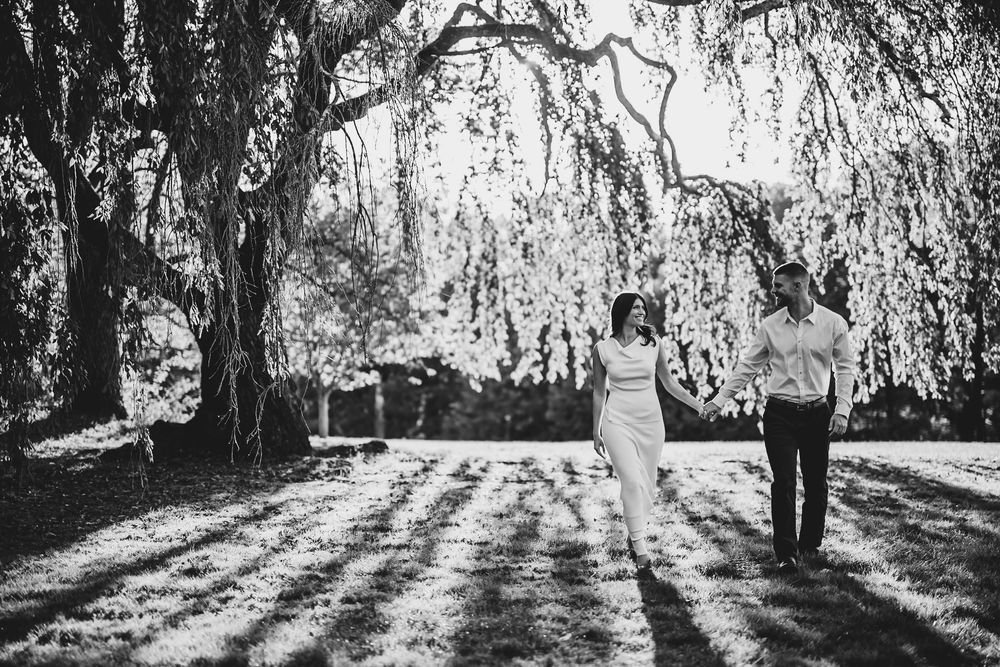 Black and white portrait series beneath dramatic willow tree branches.