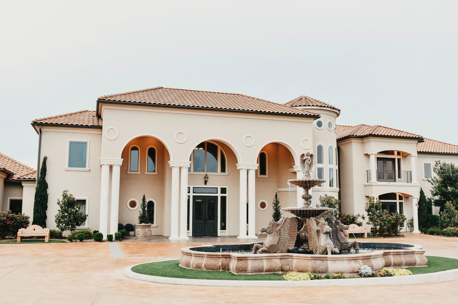 Tuscan-inspired vineyard wedding venue with vineyard rows, chapel & ballroom