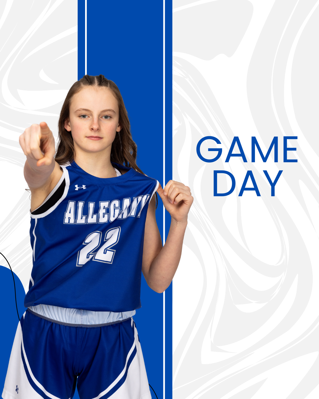 Karen Morgan Photography sports media day Basketball player in blue Allegany jersey number 22 poses against team