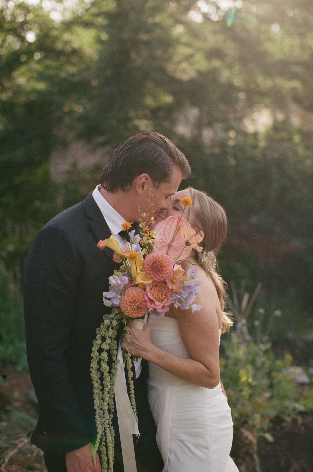 Dreamy couple & colourful flowers on film. Howdy Pictures wedding photographers in New Zealand, Nelson, Auckland, Christchurch, Wanaka.