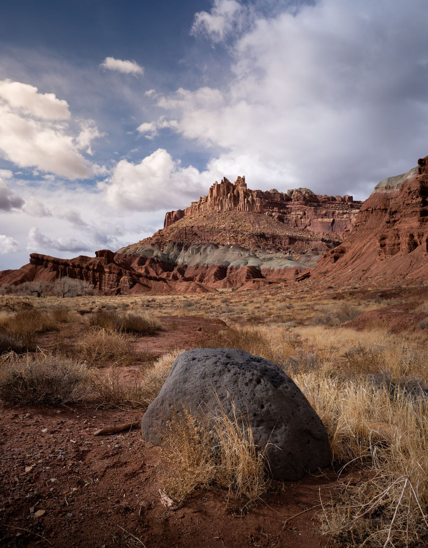 A desert skyline with dramatic clouds in Capitol Reef National Park in Utah.