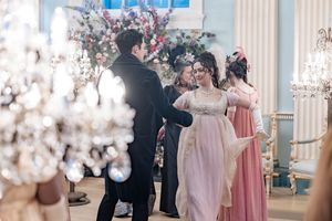 Behind the scenes of a Bridgerton Netflix filming setup at Newark Town Hall, showing a couple ballroom dancing.