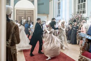 Behind the scenes of a Bridgerton Netflix filming setup at Newark Town Hall, showing all the dancers dancing.