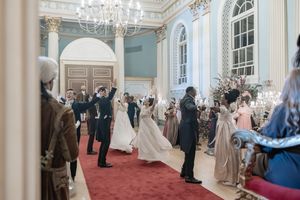 Behind the scenes of a Bridgerton Netflix filming setup at Newark Town Hall, showing dancers in their ballroom attire.