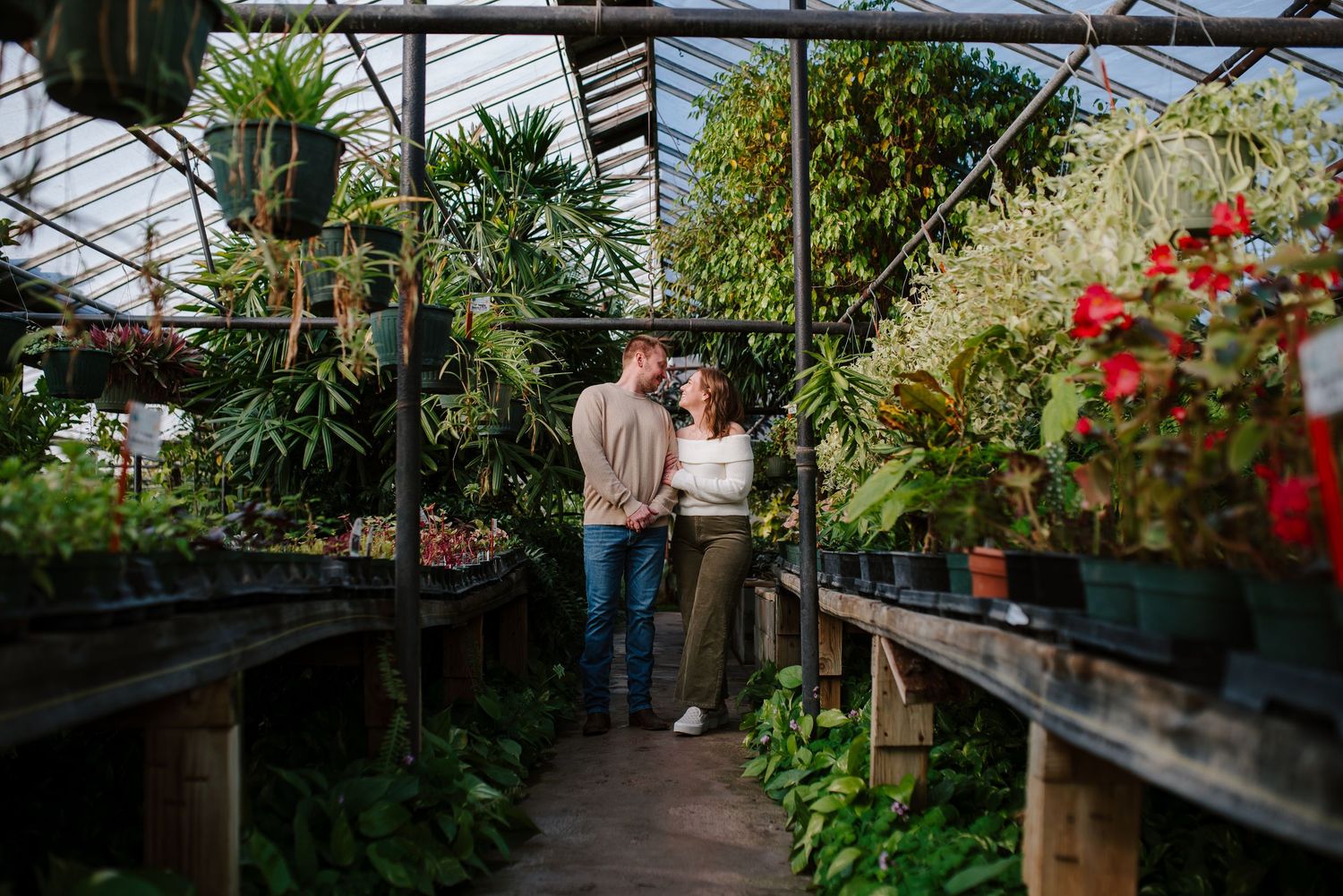 Greenhouse engagement session in Wichita, KS - Plant Kingdom engagement pictures by Jessica Nadine Photography