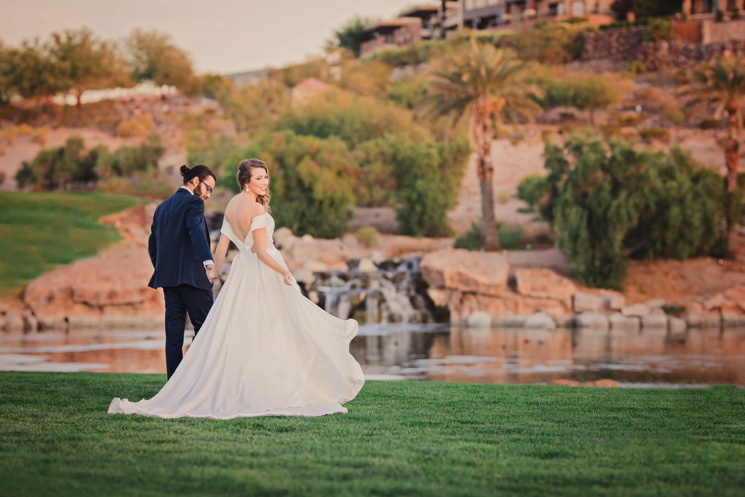 bride and groom portraits at DragonRidge Country Club sunset