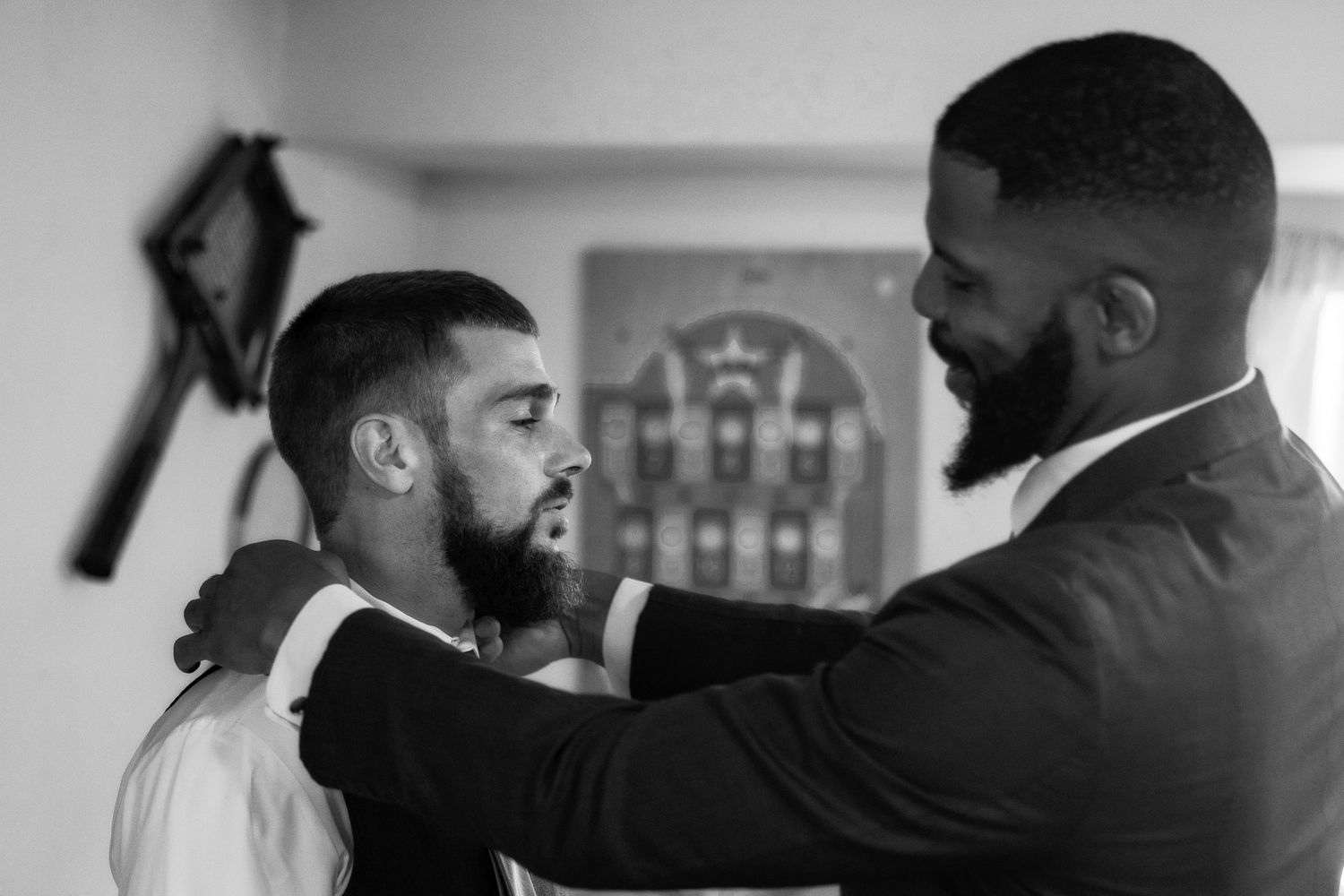 frederick maryland wedding photographer Black and white image showing two people in formal attire sharing a moment.