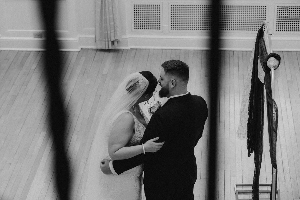 Bride and groom during first look at Yorktowne Hotel wedding in York PA