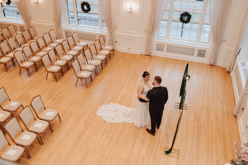 Bride and groom during first look at Yorktowne Hotel wedding in York PA