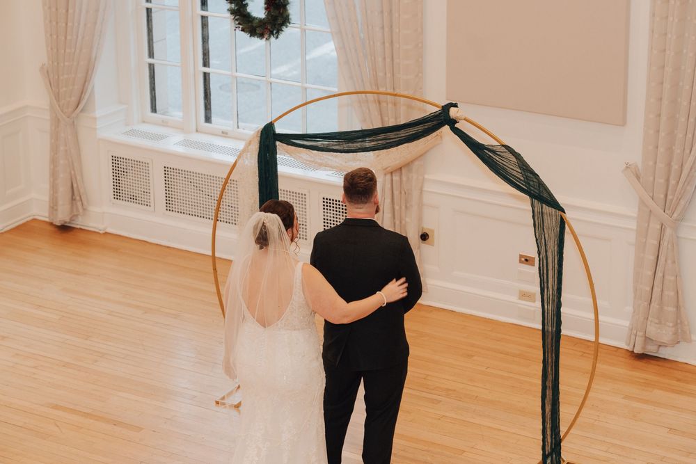 Bride and groom during first look at Yorktowne Hotel wedding in York PA