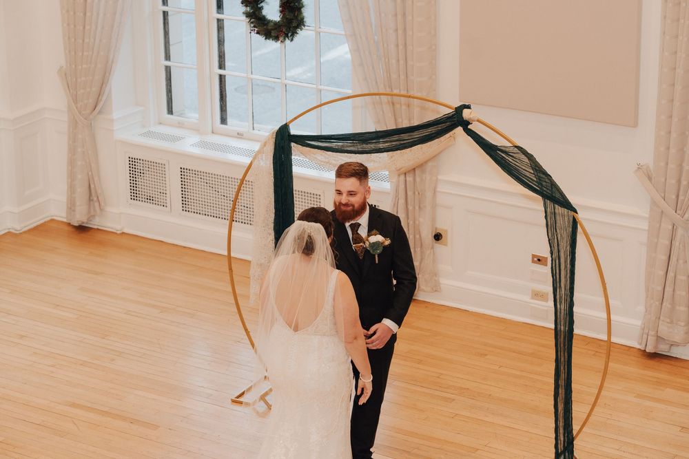 Bride and groom during first look at Yorktowne Hotel wedding in York PA