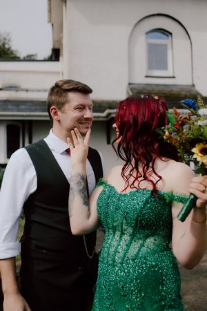 A sequence of candid moments showing a couple laughing and embracing, with the person wearing an emerald green sequin dress.