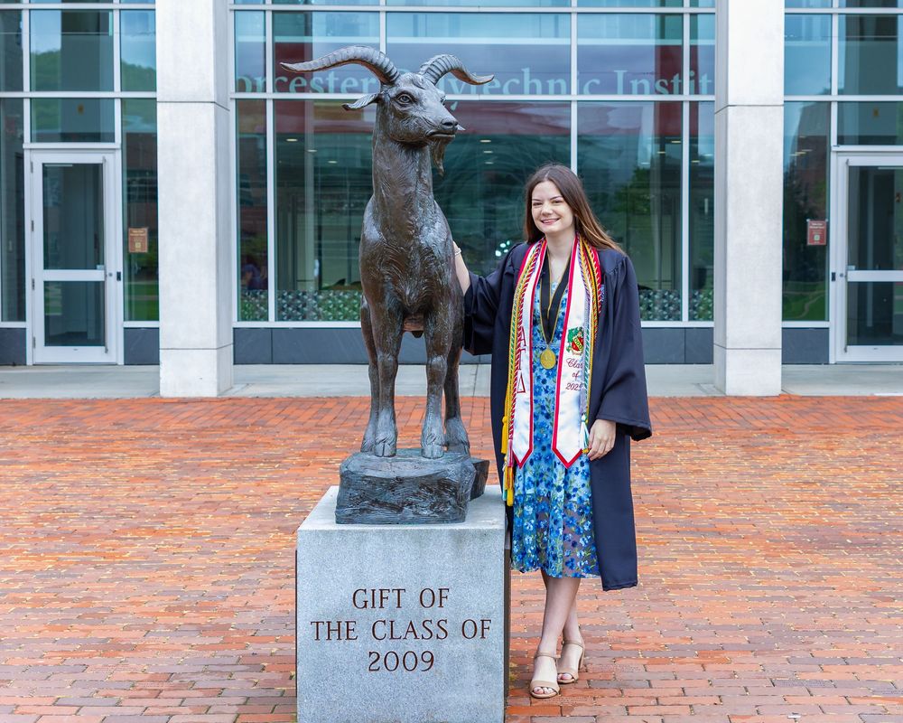 Worcester Poly Tech graduation cap and gown portraits on campus. Graduation portraits for Boston University, Boston College, Regis College.