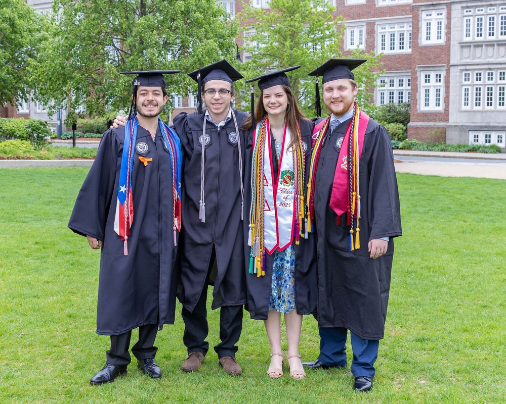 Worcester Poly Tech graduation cap and gown portraits on campus. Graduation portraits for Boston University, Boston College, Regis College.