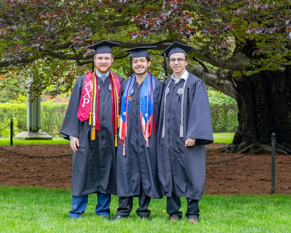 Worcester Poly Tech graduation cap and gown portraits on campus. Graduation portraits for Boston University, Boston College, Regis College.