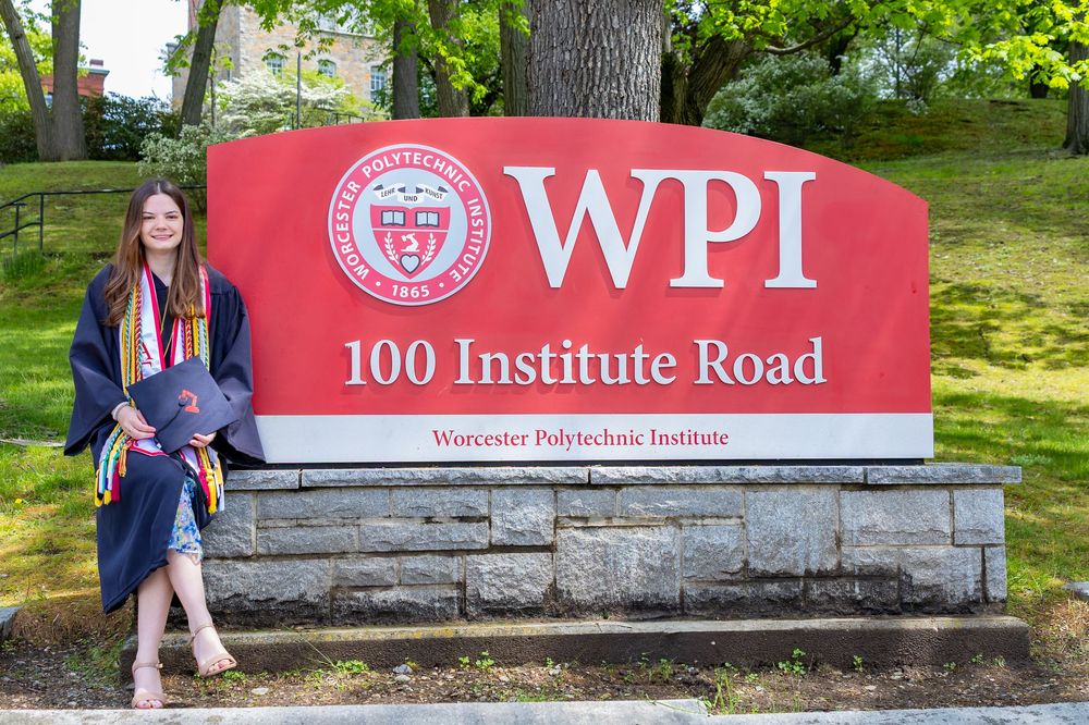 Worcester Poly Tech graduation cap and gown portraits on campus. Graduation portraits for Boston University, Boston College, Regis College.