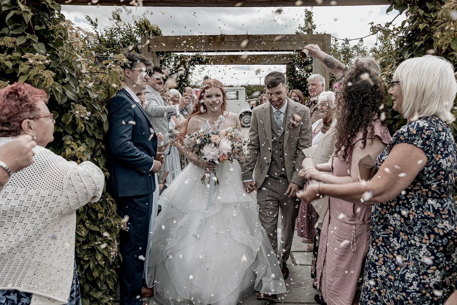 Confetti exit after ceremony Beverley Barn Wedding venue.