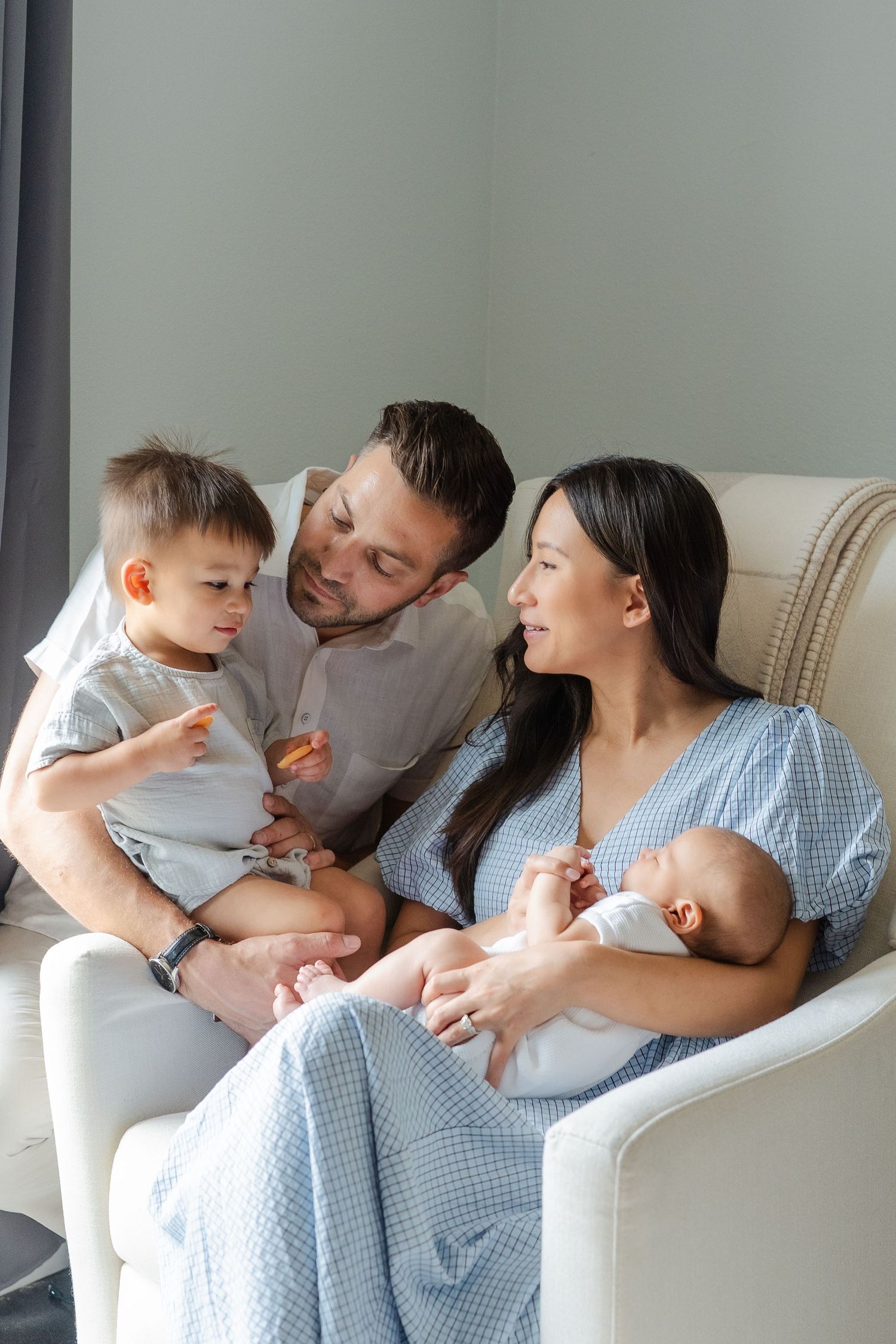 newborn family photo session in nursery