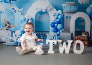 Blue birthday setup with an aeroplane theme for the boy's birthday portraits.