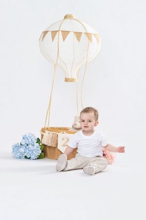 Minimal neutral birthday portrait photography for children in the Cumbernauld studio.