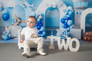 Aeroplane-themed birthday portrait session for toddlers in a studio near Glasgow.