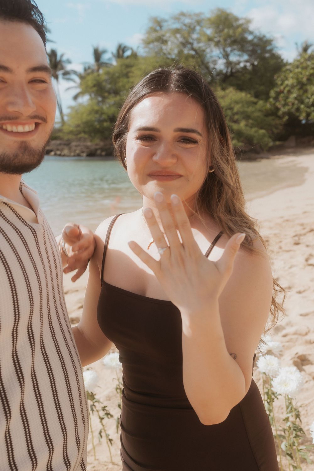 Series of joyful reaction shots capturing a surprise moment at a sunny beach.