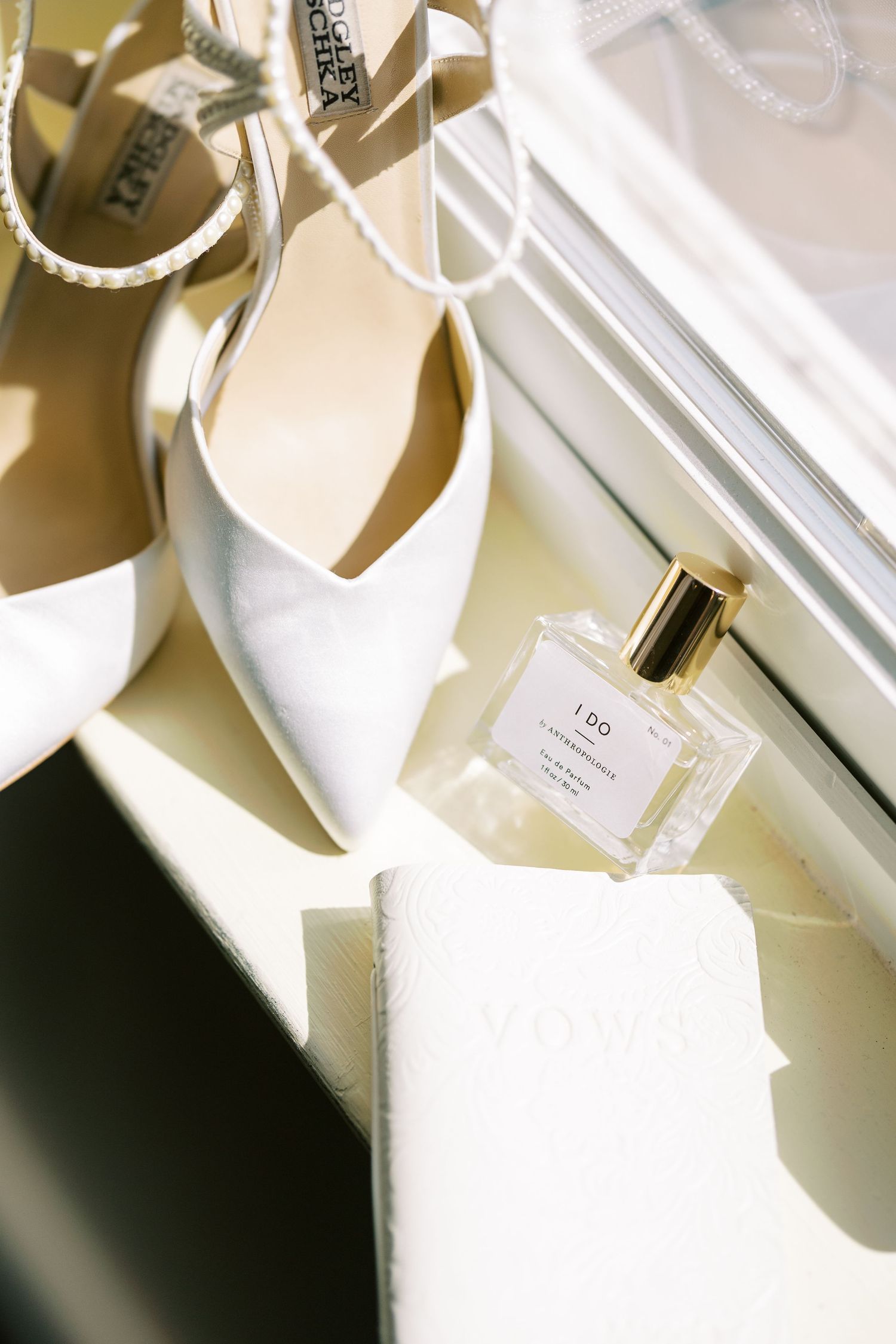 Multiple views of cream colored paper tags or labels with text arranged in a diagonal composition with soft lighting.