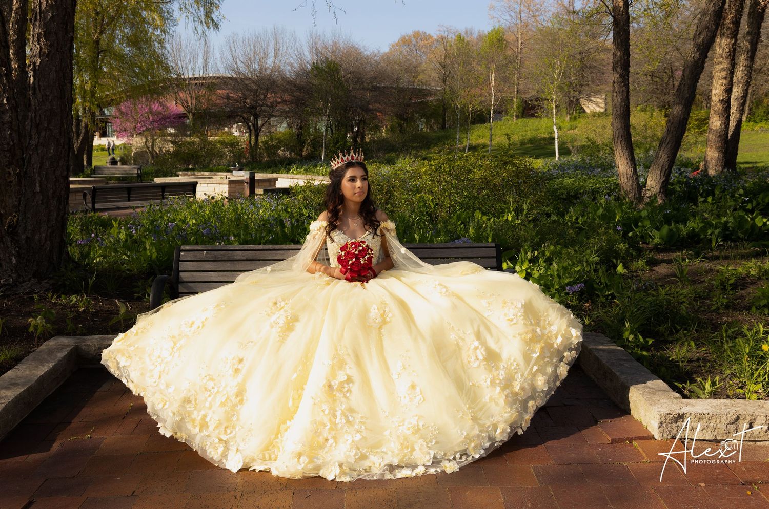 Aileen posing in her yellow Quinceañera dress in a floral park. Professional Mis XV photography at Independence Grove by Alex T.