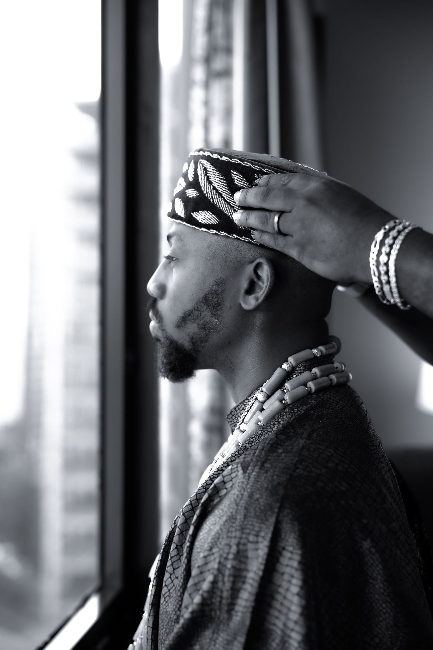 A dramatic black and white profile portrait series showing contemplative side views.