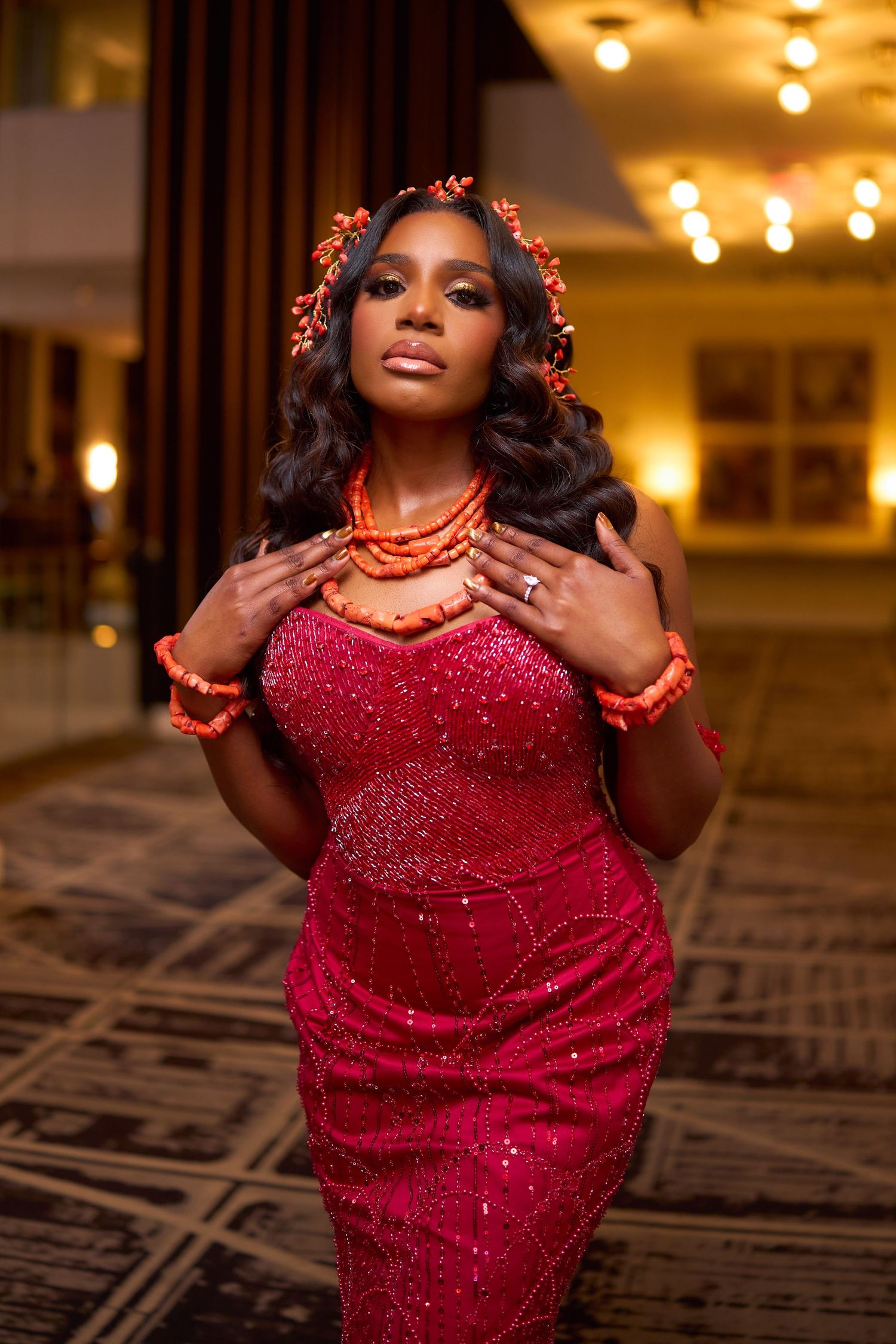 A person in a sparkling red sequined evening dress poses elegantly in sequence across multiple photos.