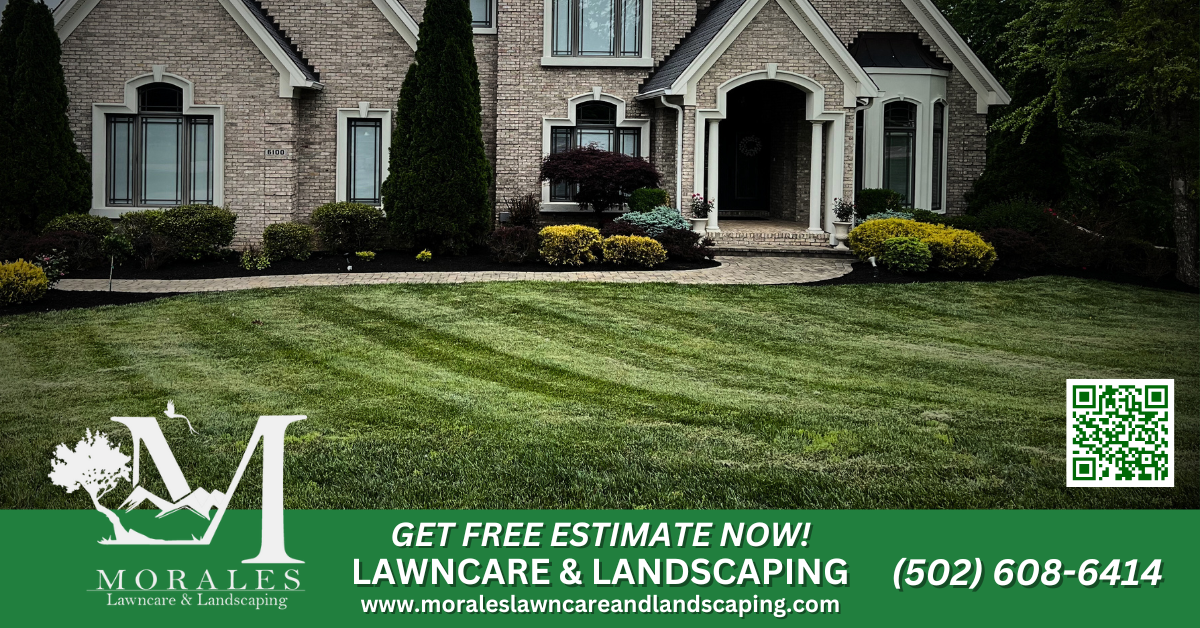 Professional lawn care service employee mowing a residential property with stripes in the freshly cut grass.