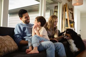 A series of photos showing people sitting on couches and interacting in a casual indoor setting.