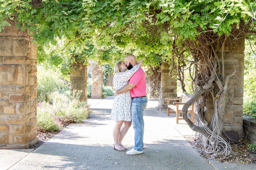 Natural candid couples portraits in a Texas botanical garden
